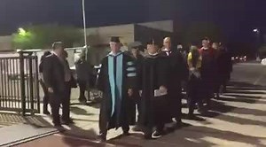 The platform party leads the procession, with AWC President Dr. Glenn Mayle (l) and Northern Arizona University - Yuma Branch Campus Executive Director Dr. Michael Sabath leading the way. This is Dr. Mayle's 38th commencement on the platform, and his last, as he retires this year. | Arizona Western College