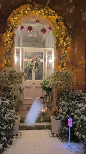 Ramsey Residence on Instagram: "MAGICAL Hi everyone! I love how our front porch looks again this year, but capturing real falling snow makes it look even more Christmassy and magical! ✨ Yes I did stand outside at 11 o’clock at night in my dressing gown getting wet through to capture this! 🤣 You’re welcome! 😆 . . . . . #loverenovate #pinkdoorsofinstagram #myhometoinspire #pinkfrontdoor #pinkdoor #edwardianfrontdoor #myperiodinterior #myperiodhomestyle #christmasdecor #frontdoorsofinstagram #fro