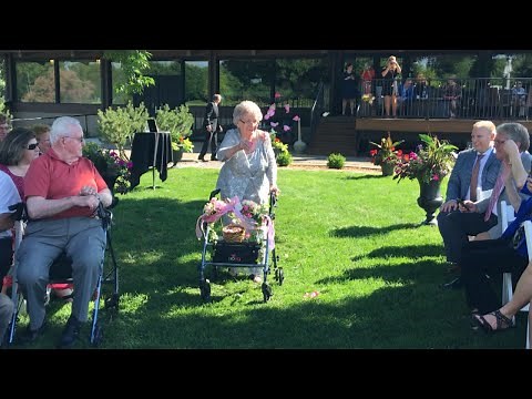 92-Year-Old Grandma Wows Guests as Flower Girl in Wedding With Decorated Walker