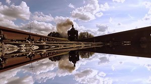 Historical Steam Engine Train locomotive Driving on railroad tracks