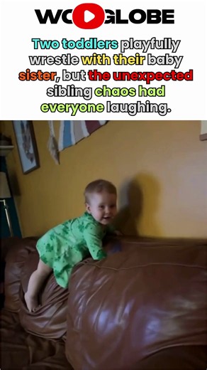 Playful sibling chaos as two toddlers wrestle with their baby sister
