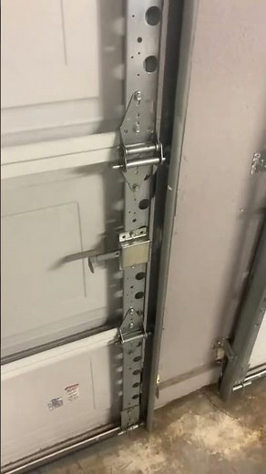 How to replace the bottom roller on your garage door.