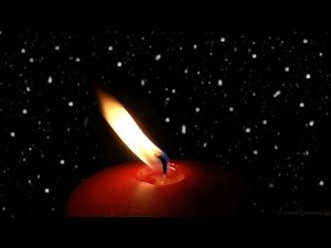 Flickering Candle Flame with Snowy Background (HD)