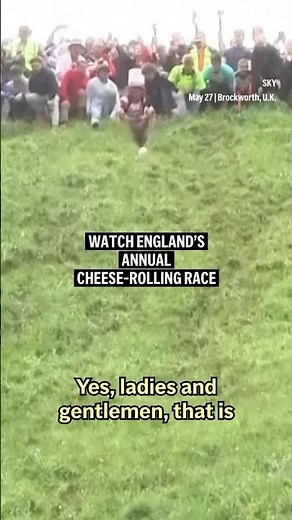 Dairy-loving daredevils take part in annual cheese rolling race in southwest England