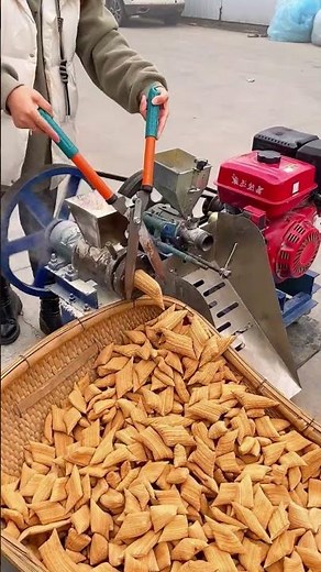 The process of making corn puffs using a machine #shorts