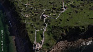 DRONE AERIAL FOOTAGE: The World War II Pointe du Hoc Ranger Monument. Pointe du Hoc is a high point between two of the five D-Day landing beaches, Utah and Omaha in Normandy, France.