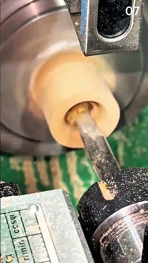 Hollowing cylindrical wood piece using lathe and cutter