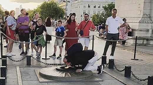 Man sparks outrage lighting cigarette with eternal flame at Arc de Triomphe