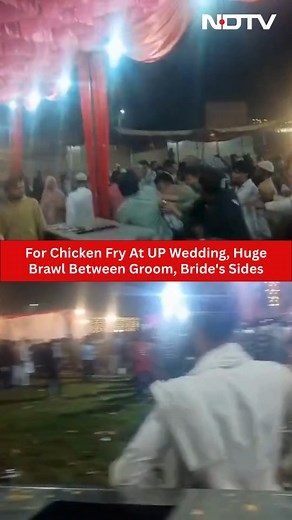 What was supposed to be a joyful wedding celebration in Uttar Pradesh's Bijnor district descended into chaos when crowds gathered at the chicken fry counter, leading to a brawl that left several people injured. The fight broke out between members of the groom's and bride's sides over the serving of chicken fries. The situation quickly spiralled out of control, forcing police to intervene. The wedding rituals were eventually completed under police protection. | NDTV