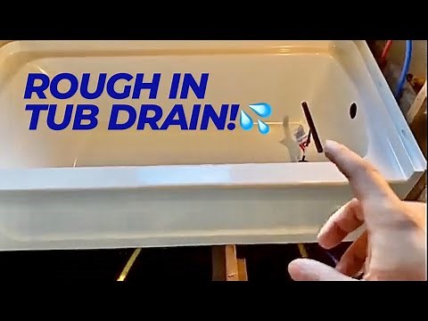 How to rough in pvc drain pipes for a bathtub from the main sewer drain.