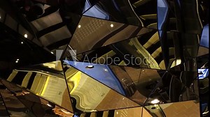 TOKYO, JAPAN - NOV 2023 : View of crowd of people and street traffic in the mirror at night. Close up shot of reflection in the mirror at downtown city. Time lapse shot.