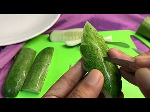 Carve cucumbers into simple leaves and flowers