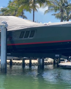 The massive Cigarette 59 Tirranna sitting on a lift down in South Florida. Backyard goals?! Comment if you agree!⁣ ⁣ Check out @nautical.network for your main source of all boating content 👊⁣ ⁣ #bigbadboats #boatsgonewild #boat #nauticalnetwork #cigarette #racing | Big Bad Boats