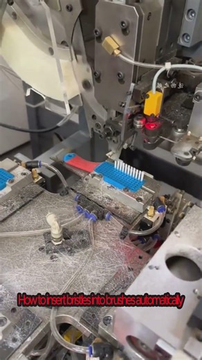 How to insert bristles into brushes automatically