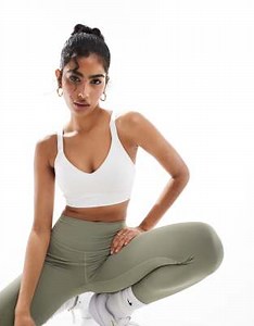 Nike Training Indy Dri-FIT medium support sports bra in white | ASOS