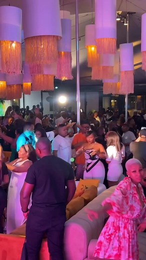 Lively Party Scene: Dancing and Socializing Fun