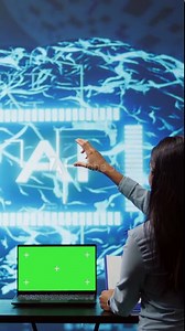 Vertical video AI developers using isolated screen device for business data analysis. IT department staff members work on chroma key notebook to automatize tasks using artificial intelligence, camera