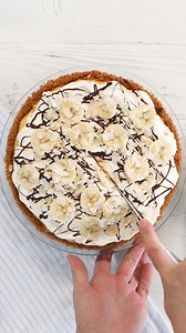 Father's Day is coming! This is the dessert dad wants. Chef Eddy's Banana Cream Pie is piled high with banana cream filling, freshly made whipped cream, banana slices, coconut flakes, and a drizzle of chocolate. To make the banana cream pie filling extra silky, replace regular milk with coconut milk. Get the recipe: https://www.dixiecrystals.com/recipes/banana-cream-pie #bananacreampie #bananapie | Dixie Crystals