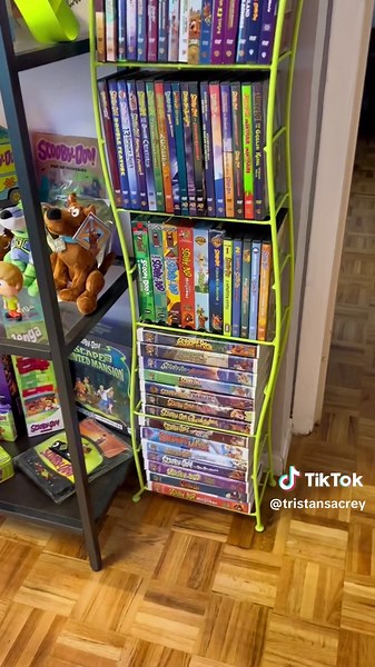 Its time for another Thrift Flip for the Scooby room!! 🧡💚🩵 We found these old plastic ikea shelves at Goodwill recently (video’s on my page 😉) and we thought they’d be perfect for our Scooby-Doo VHS tapes!! #scoobydoo #collector #collection #secondhand #thrift #thrifted #thriftfinds #display #shelf #ikea #vintage #vhs #dvd #storage #storagehacks #canadiantire #diy #upcycle #upcycling #makeover #spraypaint #mysteryinc #mysterymachine