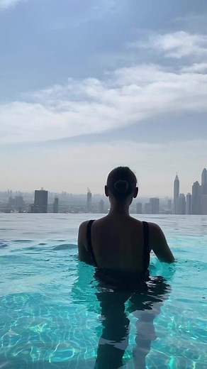 1.8K views · 52 reactions | Gaze out over the crystal-clear infinity pool and be mesmerized by the stunning spectrum of blues that surround you. @jandangela Book your experience at auraskypool.com | Aura Skypool Dubai | Facebook
