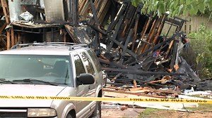 One minute, they were lying in their beds. Then, their house exploded and collapsed around them.