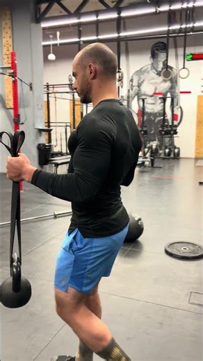 Isometric banded bicep curl walk