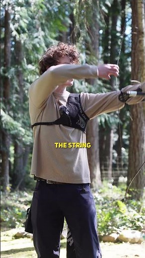 Why do archers wear chest protectors?