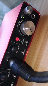 Microphone picks up loud signal when recording, but audio interface gain's at minimum