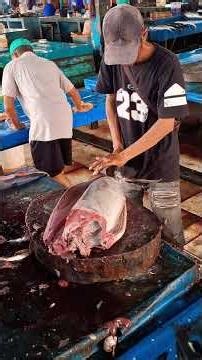 Handsome young man shows off his skills cutting baby tuna #fillet #fish