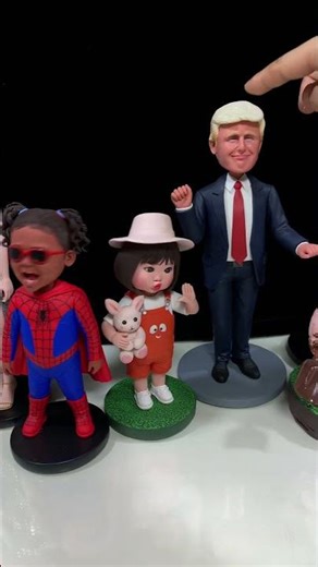 Cute Handmade Clay Bobbleheads Shaking in Sync for Fun