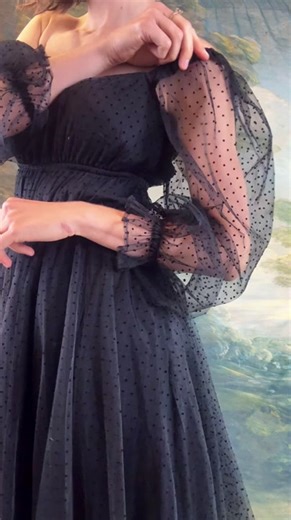 These ruffled 18th century stays are perfect for tea time or making fae mischief. Made in our classic 18th century stays style, the ruffle neckline and waistline details make this corset a rococo dream. These stays feature front and back lacing for easy adjustability, a low scooping neckline to accentuate and support the bust, and curvy waist tabs for accentuating the waist. Made in black satin fabric with a subtle floral detail.