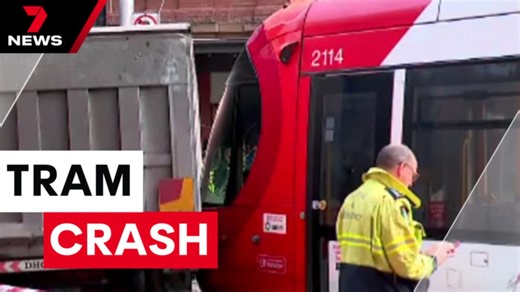 Truck and tram collide