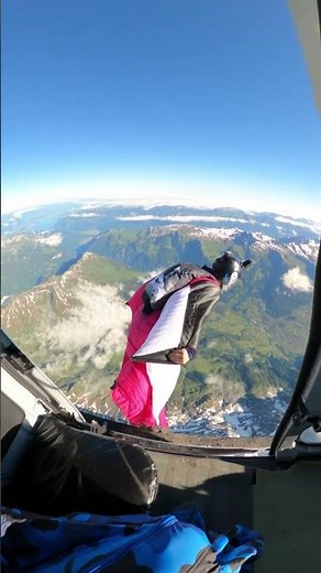 Wingsuit base jump from helicopter