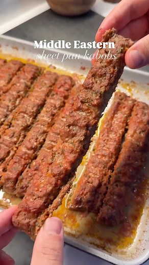 Arash Hashemi on Instagram: "💥Easy Sheet Pan Beef Kabobs I love simple, easy, flavorful Middle Eastern & Mediterranean food, and these beef kabobs are exactly that. You get all the smoky, charred flavor of grilled kabobs without firing up the grill. Just mix everything, bake it on a sheet pan, and you’re good to go. It’s high protein, mealprep friendly, and tastes even better wrapped in lavash with this amazing salad and sauce combo. Here’s how I made it: 1. Mix 2lb ground beef, 1 small grated 