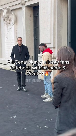 Kai Cenat Signs Fan Notebook