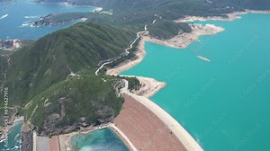 High Island Reservoir East Dam in Sai Kung Hong Kong Global Geopark ,is a rare volcanic hexagonal rock columns, beautiful scenery, hiking trails, beaches and islands, geological formations, sea bay, a