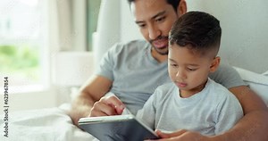 Dad, kid or tablet in bedroom for games, online learning or streaming multimedia website. Man, father and boy child relax in morning on digital technology, watching cartoon or movies together at home