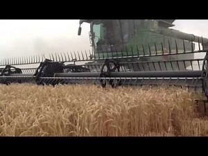 FD 70 Macdon flex draper header attached to S680