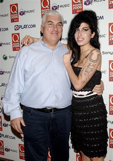 Amy Winehouse's father sues singer's two best friends