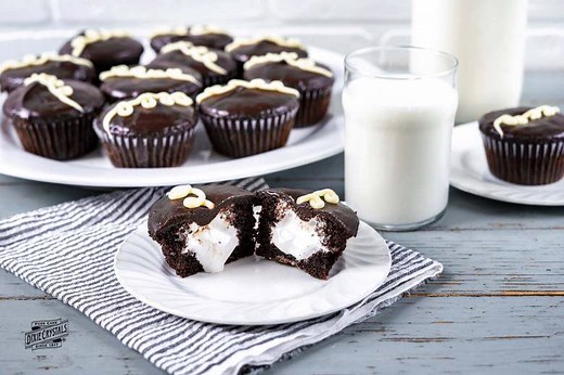 Did you love Ding Dongs when you were a kid? Our Ding Dong Cupcakes have all the flavor of the classic sweet treat but in a cupcake form. Recipe here: https://bit.ly/2knErh5 | Dixie Crystals