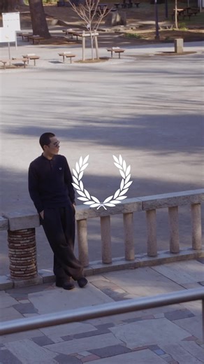 A timeless tennis icon turned subcultural staple: a piece that has always blurred the lines between sportswear and streetwear. @1eeyvng wears the Long Sleeve Fred Perry Shirt. #FredPerry #FredPerryShirt #Japan #DNA