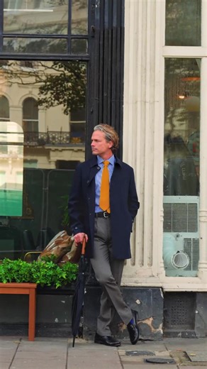 A perfect balance of form and function. The navy luxury raincoat is the last word in rainy-day finesse: superbly cut in a crease-resistant, fine wool mix, with stylish details for a smooth silhouette. Paired with our grey deluxe wool-silk trousers, it’s an ensemble that carries confidence from office to weekend - refined, practical, and quietly distinguished. #PeterChristian #Menswear #Fashion #Raincoat