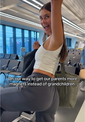 Couple Traveling the World Collecting Magnets