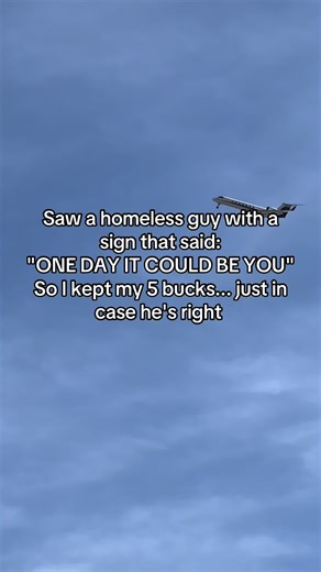 A Humorous Encounter with a Homeless Guy's Sign