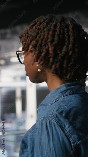 Vertical video Data center coworkers doing maintenance on mainframes handling AI processing tasks. Server hub system administrators managing storage arrays supporting deep learning training workflows