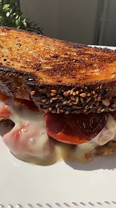 This summery cheese toastie > any other cheese toastie Ingredients: Crusty bread - nice sourdough Cherry tomatoes on the vine Thyme Balsamic Oil Taleggio | Tastemade UK