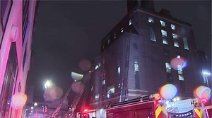 Boston firefighters battle blaze in 8 story Chinatown building