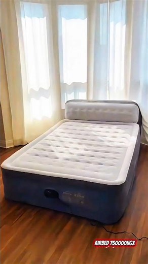 an Intex Dura-Beam Deluxe Ultra Plush Headboard Queen Air Mattress with a built-in electric pump.