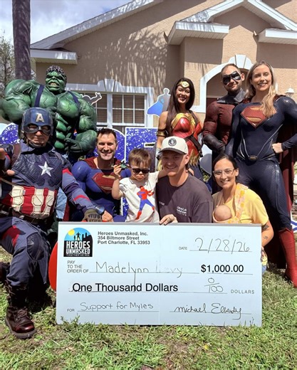 On Saturday, our Heroes Unmasked team set out with one simple goal: to bring you a moment of pure joy. We drove the (Myles) for your smile, because your smile was worth it. All six of your favorite heroes arrived together: Hulk, Superman, Supergirl, Wonder Woman, Captain America, and even Robin. They pulled up unannounced, armed with a trunk full of toys, and hearts full of gratitude. We watched you unwrap gift after gift, your laughter filling the room, your eyes wide with wonder. Those few min