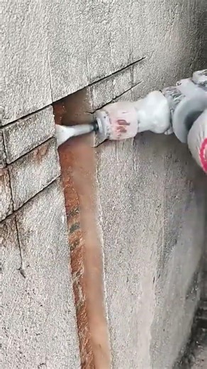 Wall chiseling technique using machine fast neat precise for safe electrical cable installation